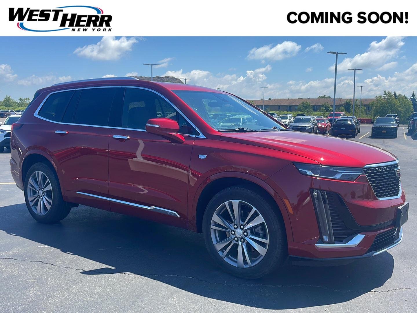 Used 2024 Radiant Red Tintcoat Cadillac AWD Premium Luxury image 1
