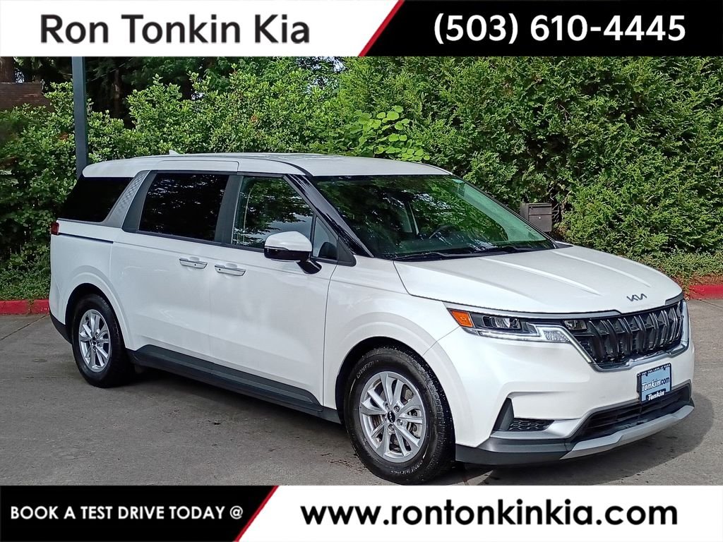 Used 2022 Snow White Pearl Kia LXS image 1