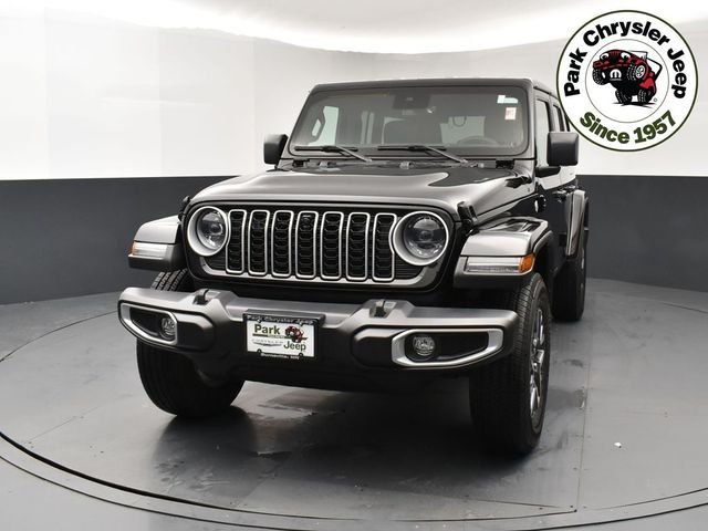 Used 2024 Jeep Wrangler 4-Door Sahara with VIN 1C4PJXEG1RW253574 for sale in Burnsville, Minnesota