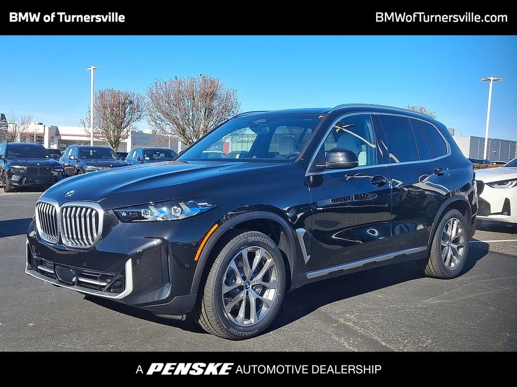 Certified Used 2026 Black Sapphire Metallic BMW xDrive40i image 1