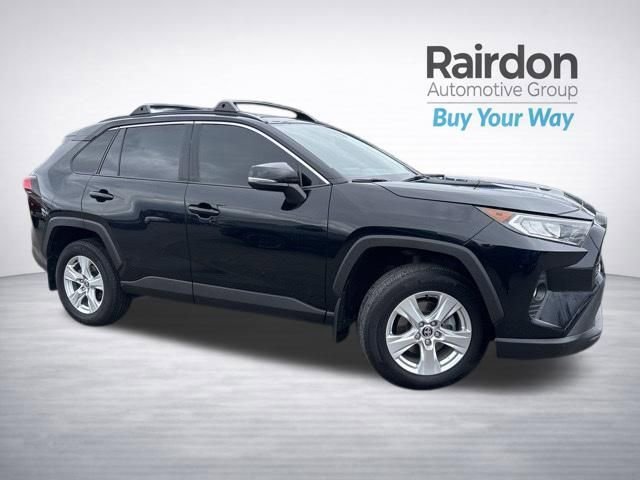 Used 2020 Midnight Black Metallic Toyota XLE image 1