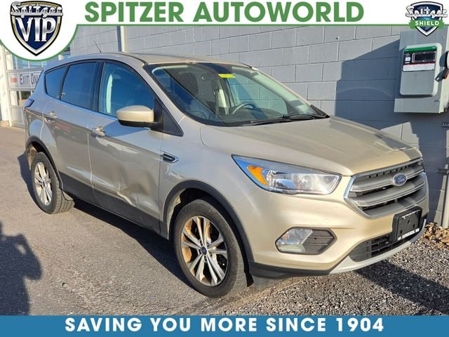 Used 2017 Gold Ford SE image 1
