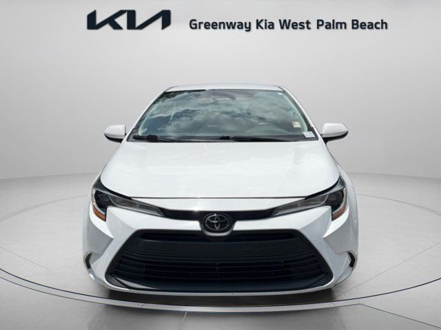 Used 2024 White Toyota LE image 2