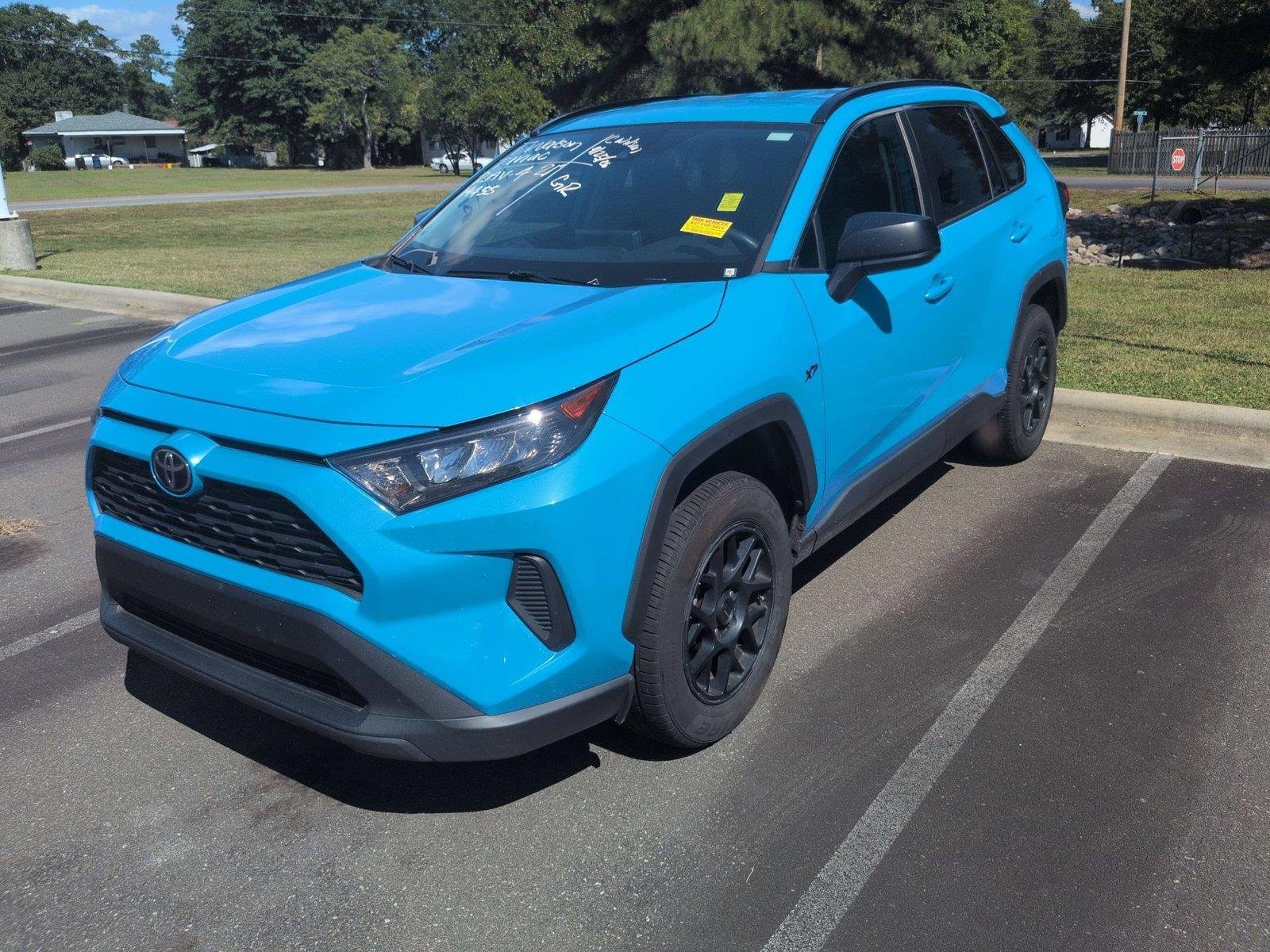 Used 2021 Blue Flame Toyota LE image 1