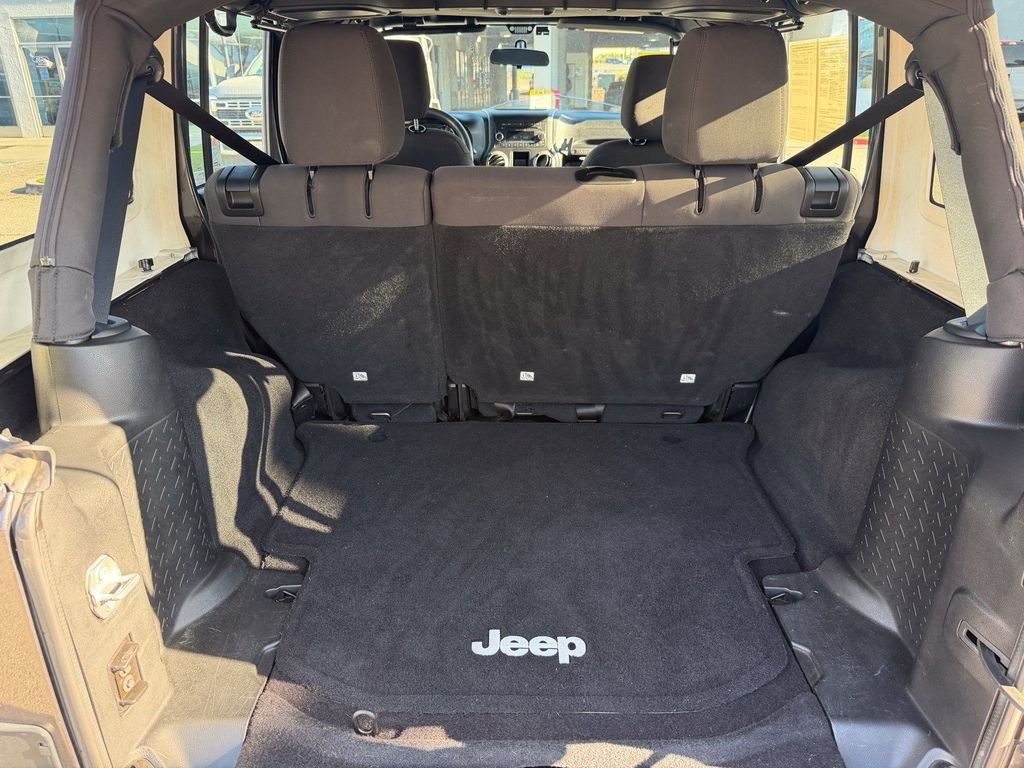 Used 2016 Granite Crystal Clearcoat Metallic Jeep Unlimited Sport image 20