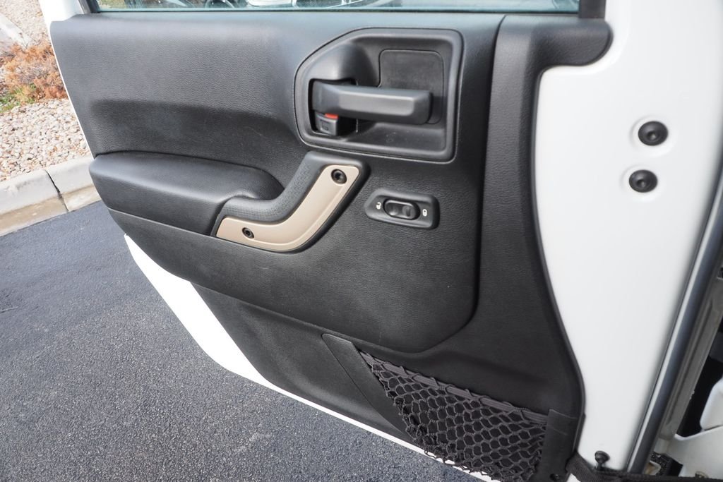 Used 2017 White Jeep Unlimited Sahara image 14