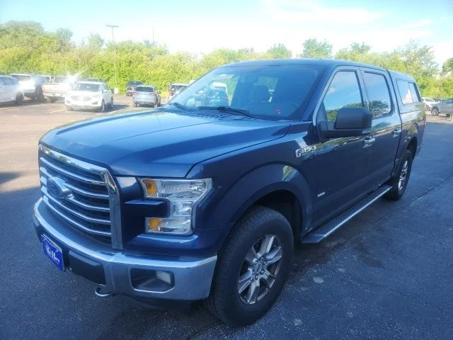 Used 2015 Blue Jeans Metallic Ford XLT image 1