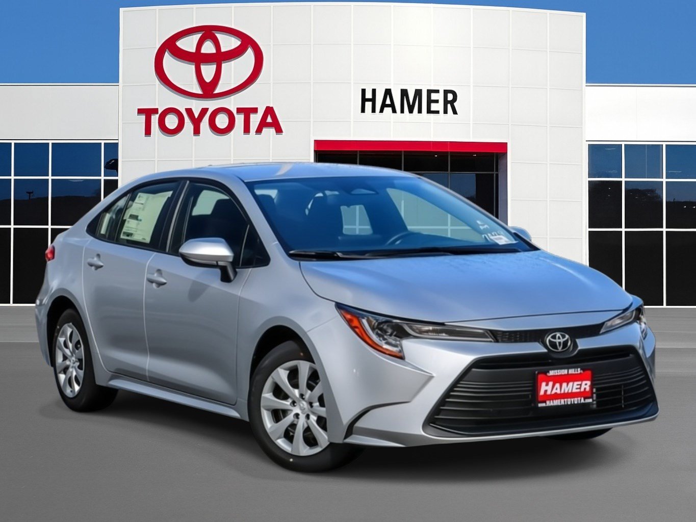New 2027 Classic Silver Metallic Toyota LE image 1
