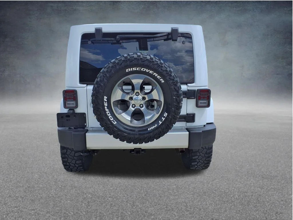 Used 2016 White Jeep Unlimited Sahara image 7