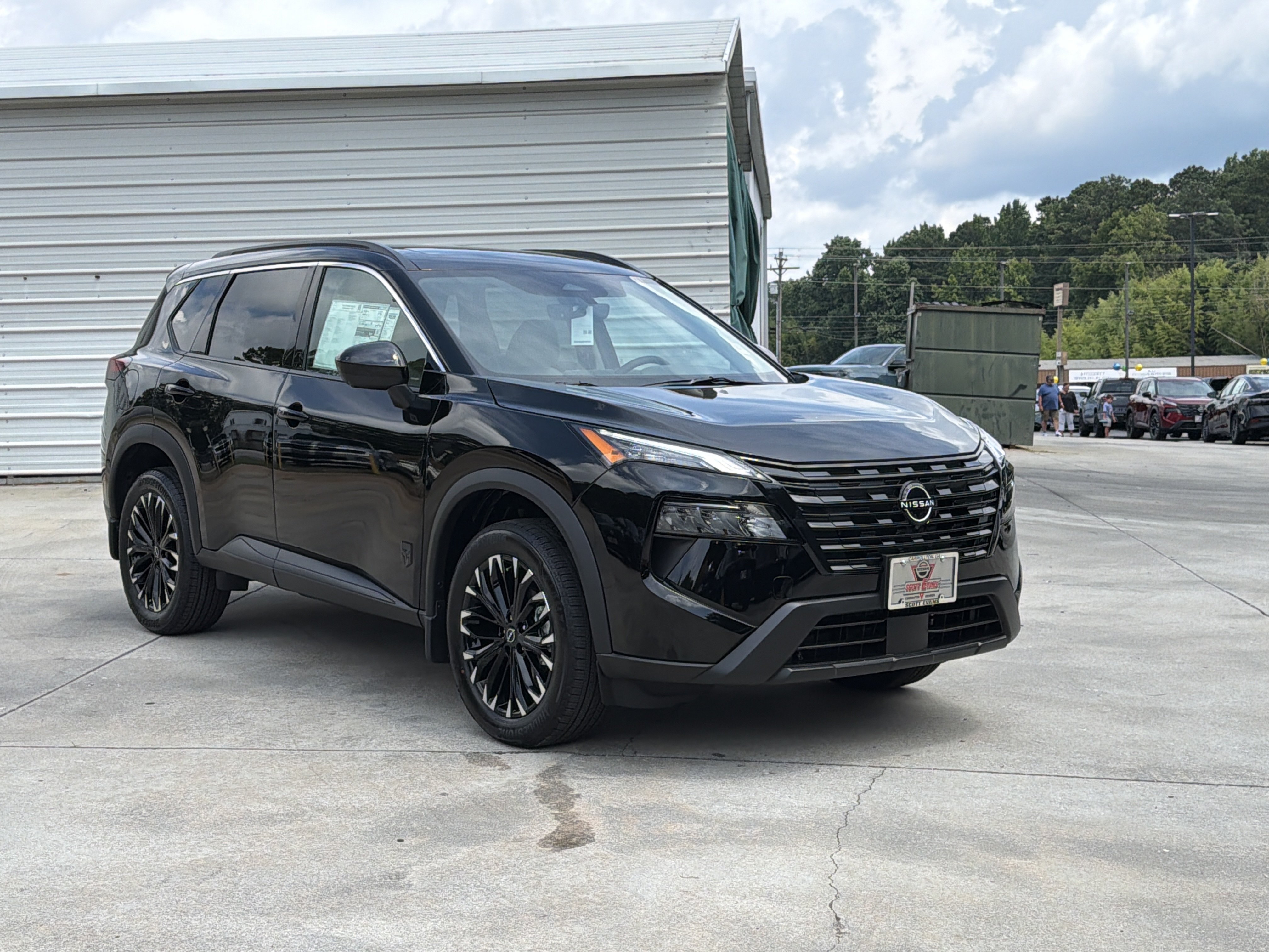 New 2026 Super Black Nissan Dark Armor image 2