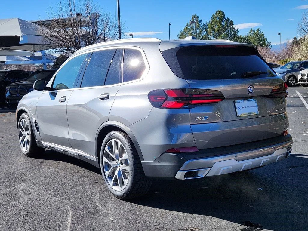 Used 2026 Skyscraper Grey Metallic BMW xDrive50e image 3