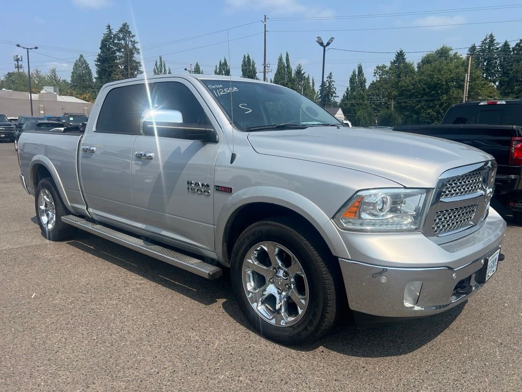 Used 2015 Bright Silver Clearcoat Metallic Ram Laramie image 1
