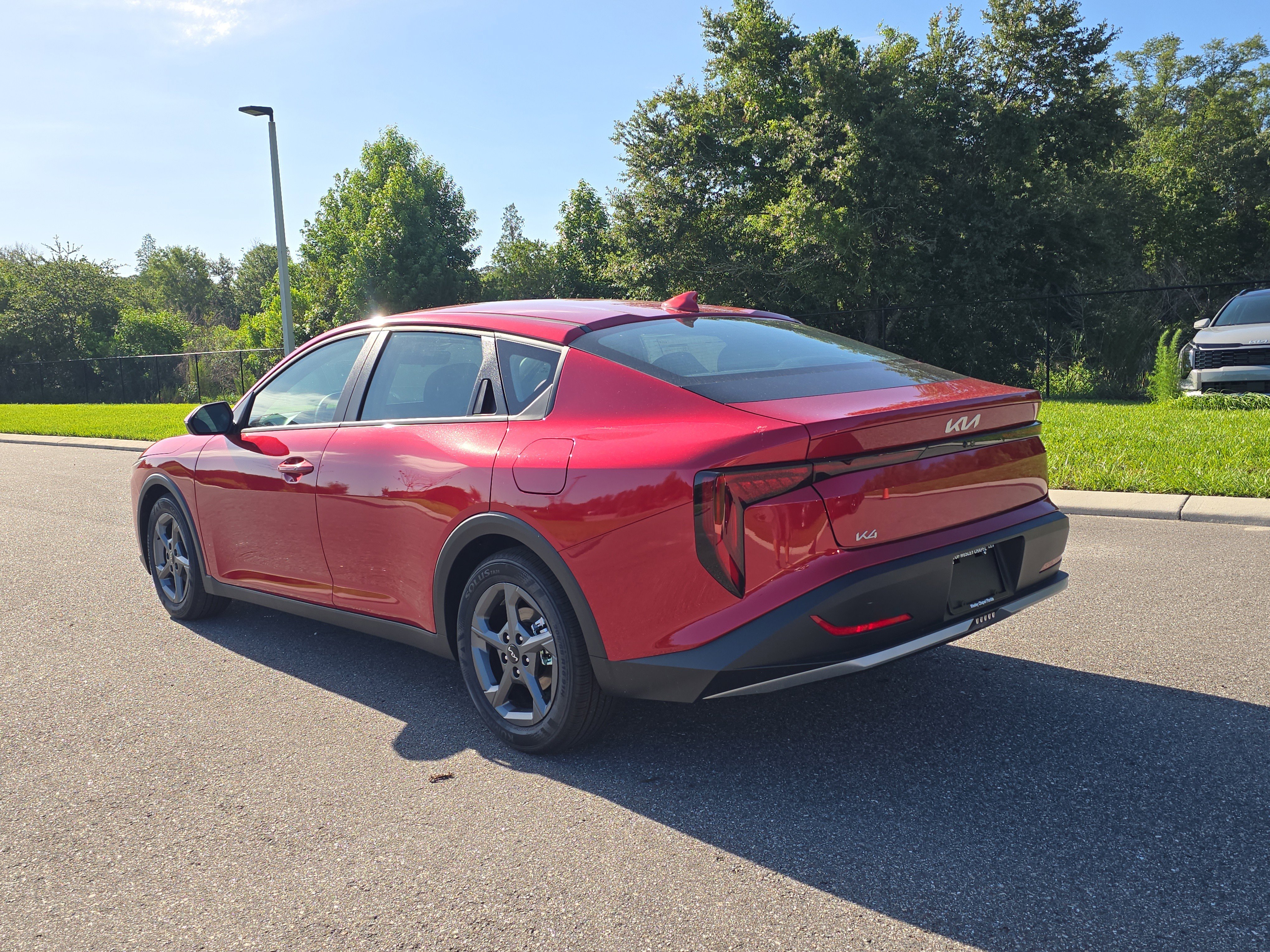 New 2026 Currant Red Kia LXS image 6