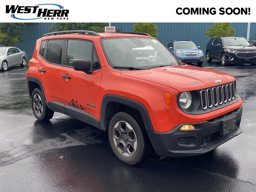 Used 2018 Omaha Orange Jeep Sport image 1