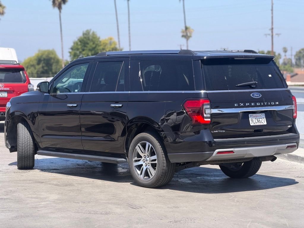 Used 2024 Black Metallic Ford Limited image 3