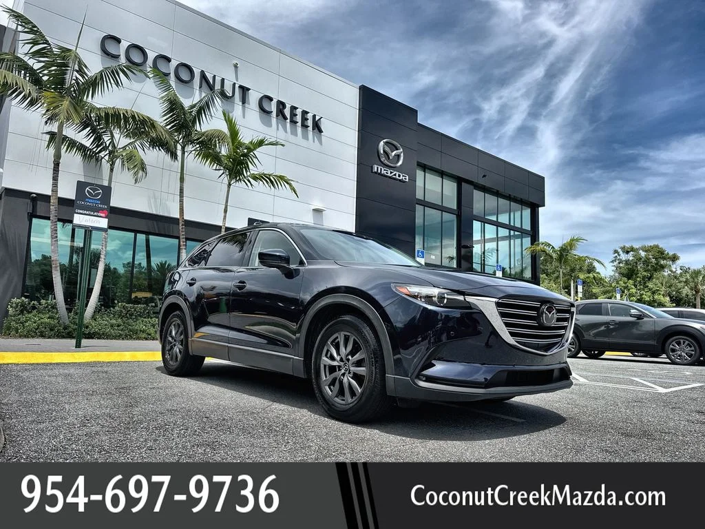 Used 2021 Deep Crystal Blue Mica Mazda Touring image 1