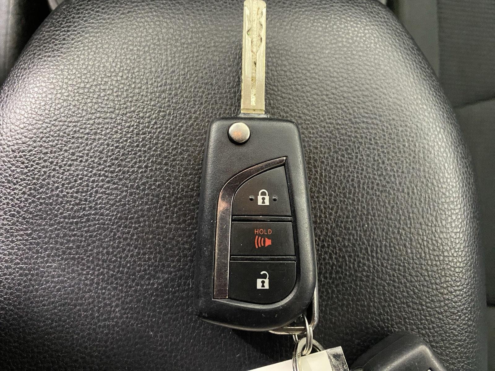Used 2021 Super White Toyota LE image 17