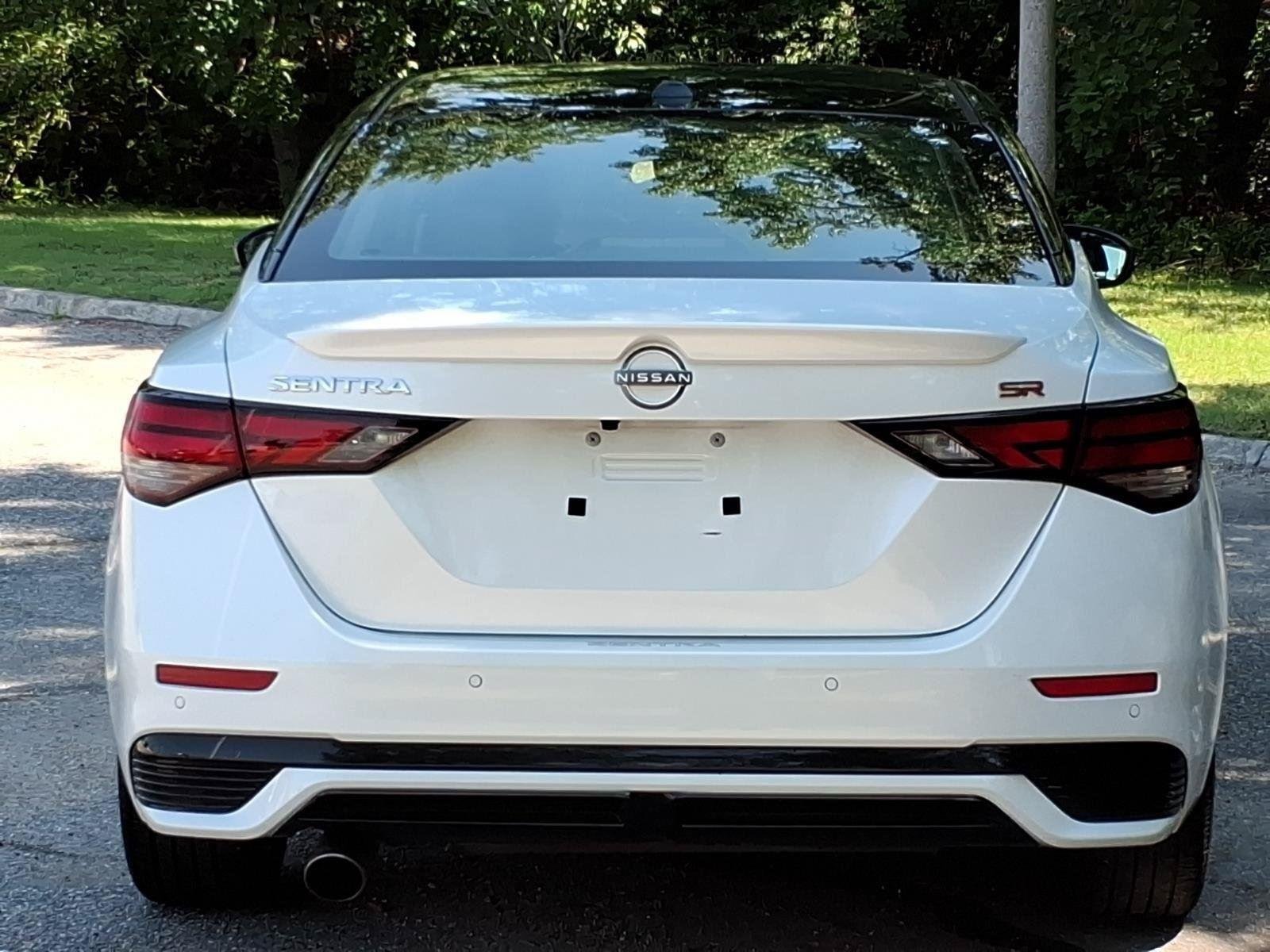 Used 2025 Aspen White Tricoat/Super Black Nissan SR image 13