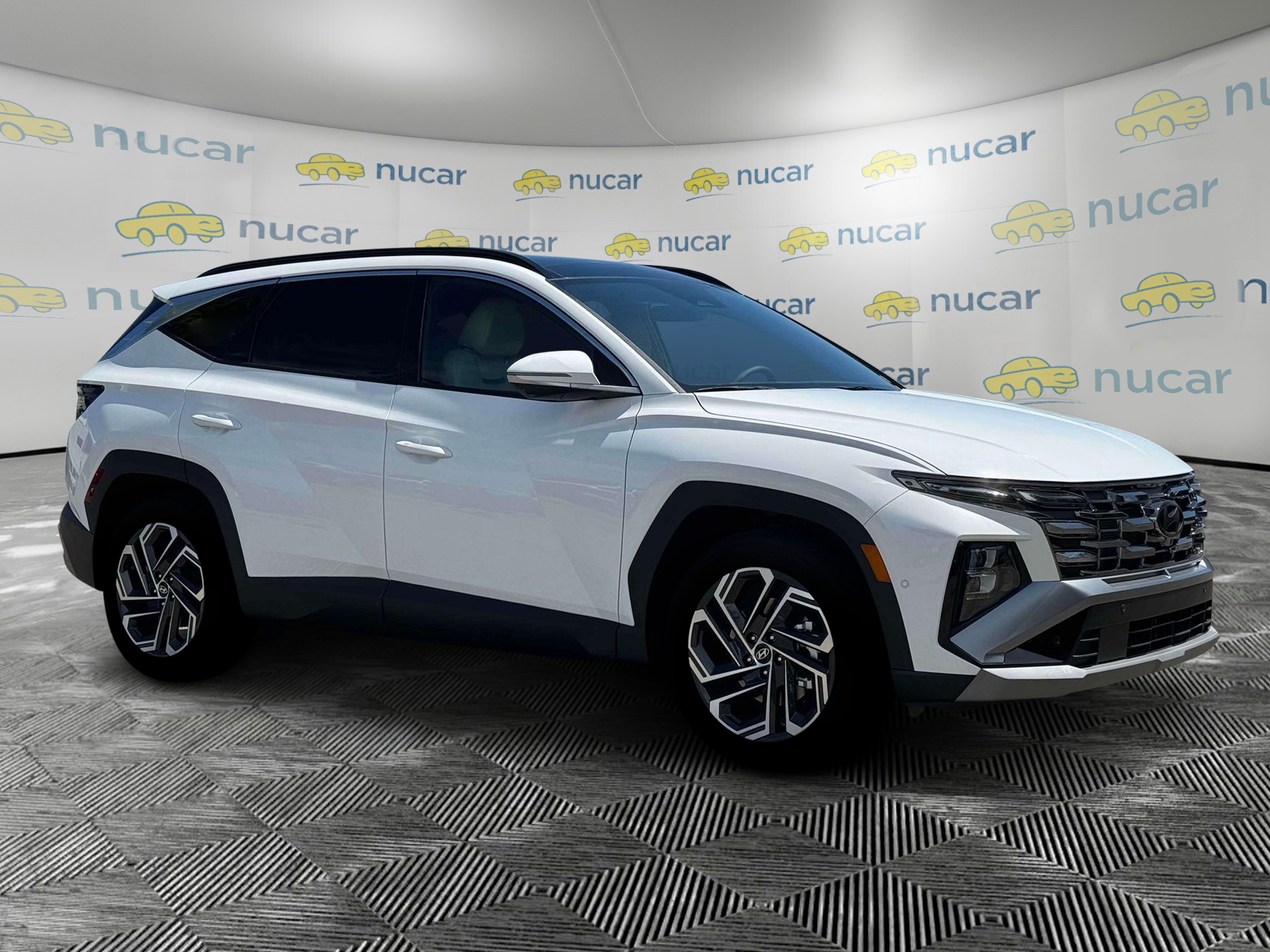 2026 Hyundai Tucson Limited in White at Nucar — photo 10