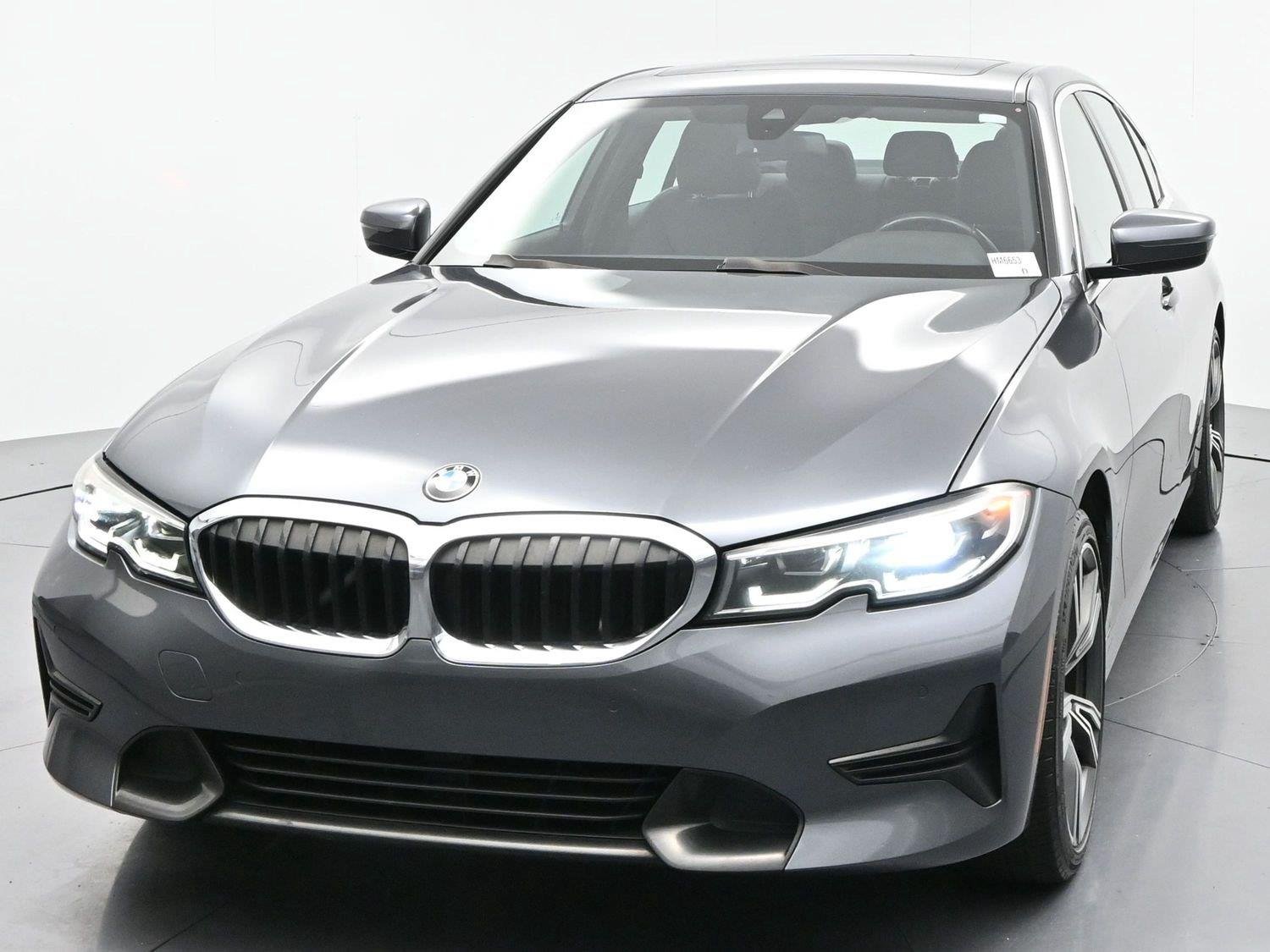 Used 2021 Mineral Gray Metallic BMW 330i xDrive image 3