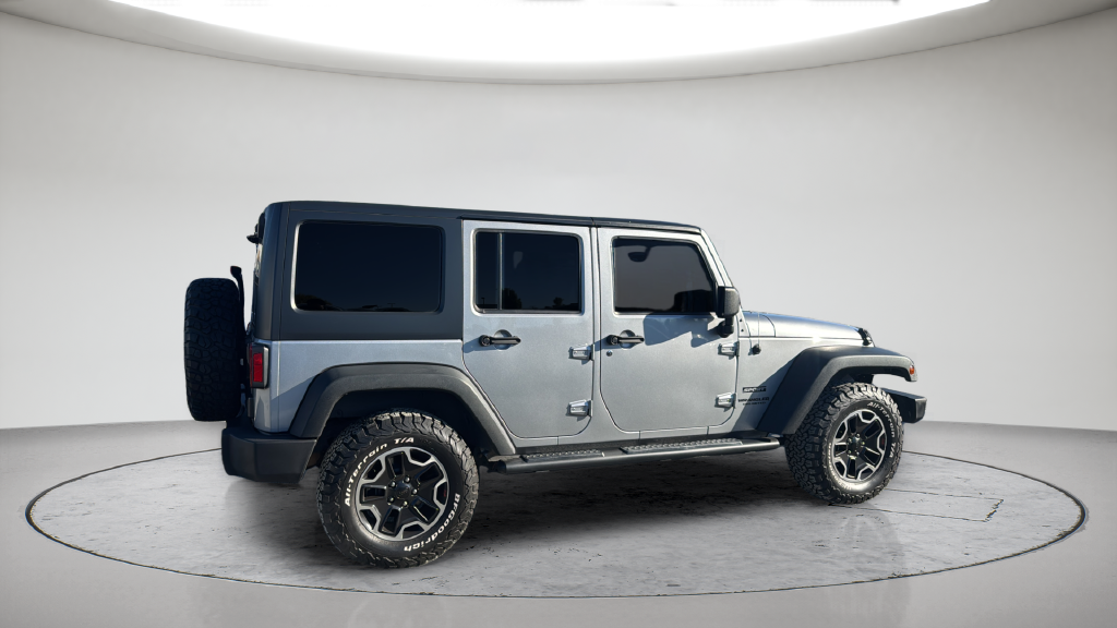 Used 2013 Silver Jeep Unlimited Sport image 8