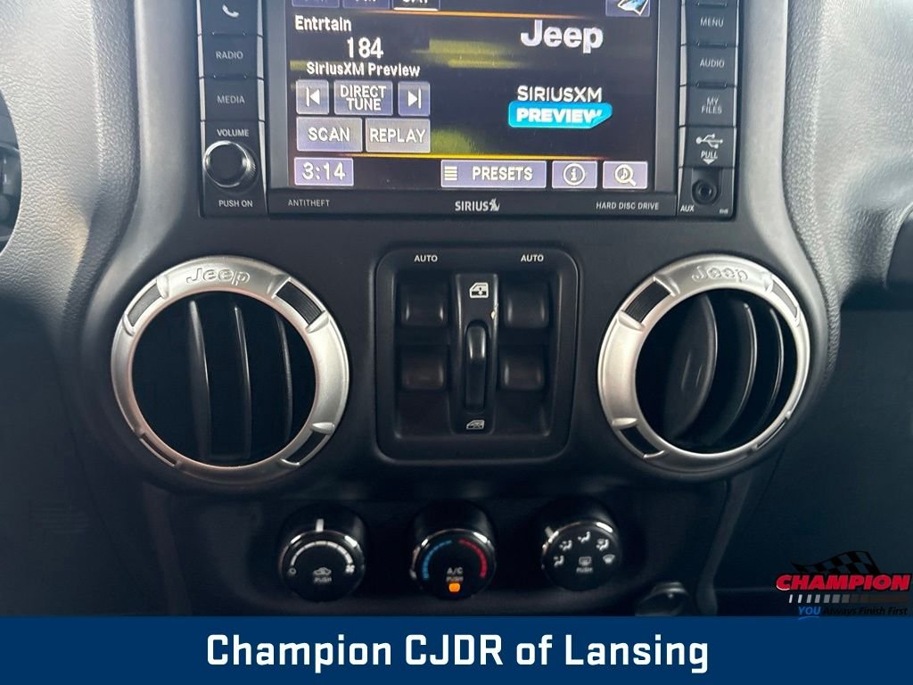 Used 2016 Black Jeep Unlimited Sahara image 20