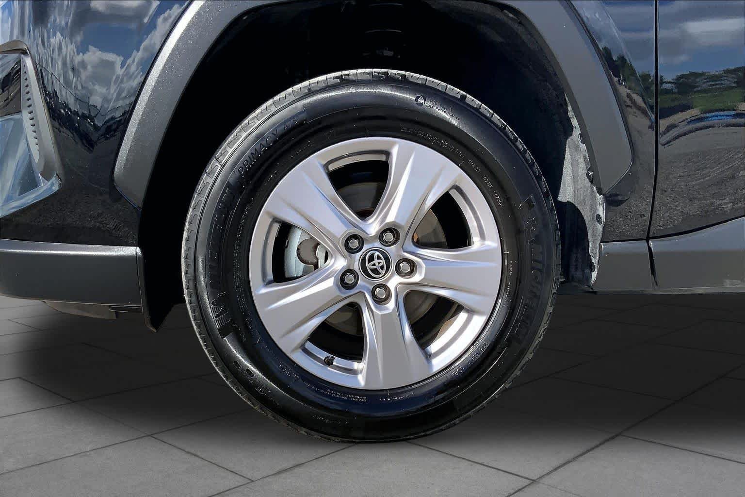 Used 2025 Midnight Black Metallic Toyota XLE image 11