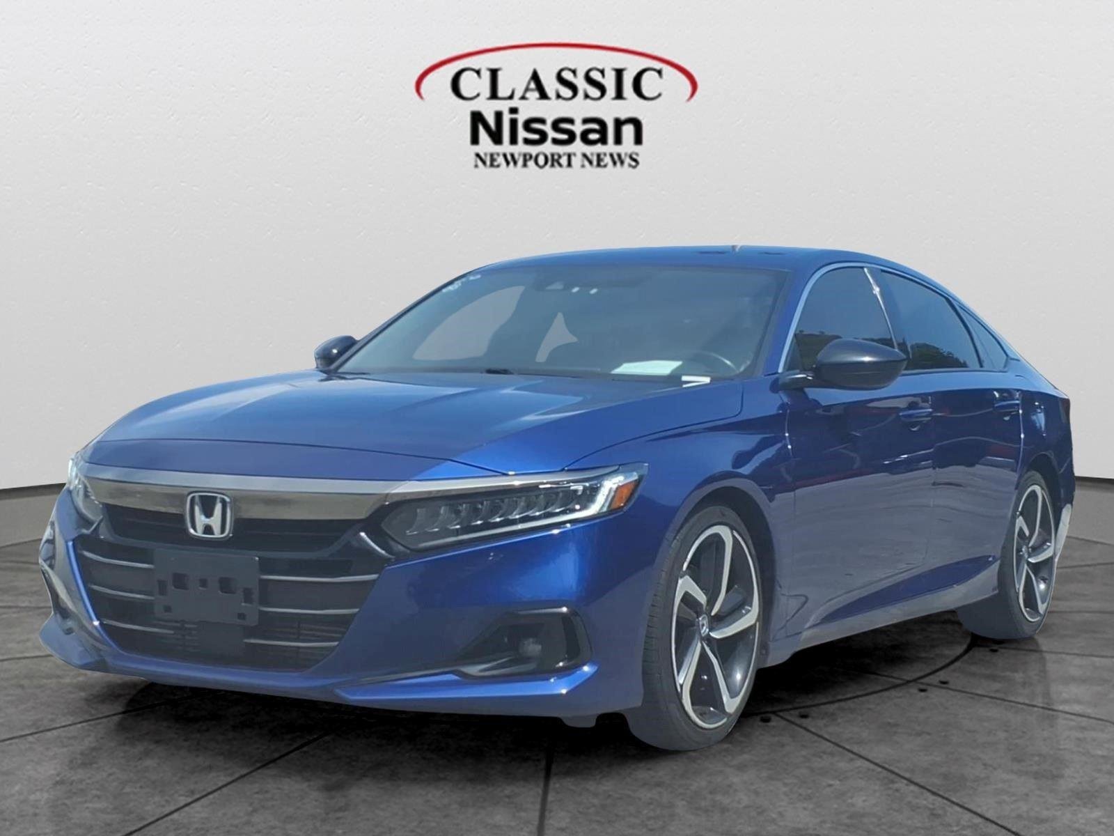 Used 2022 Still Night Pearl Honda Sport image 1