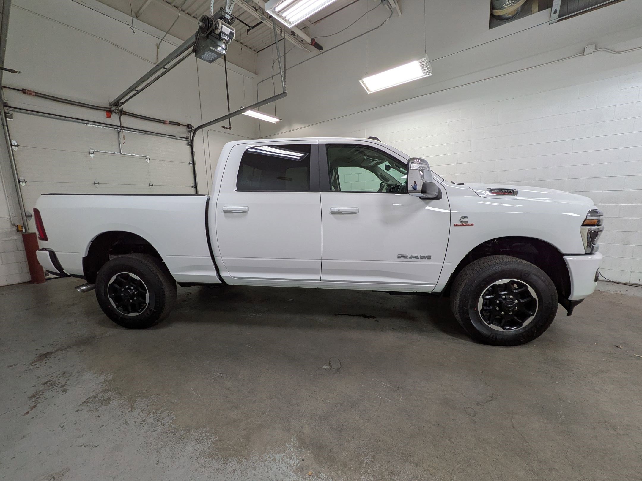New 2026 Bright White Clear-Coat Exterior Paint RAM Laramie image 3