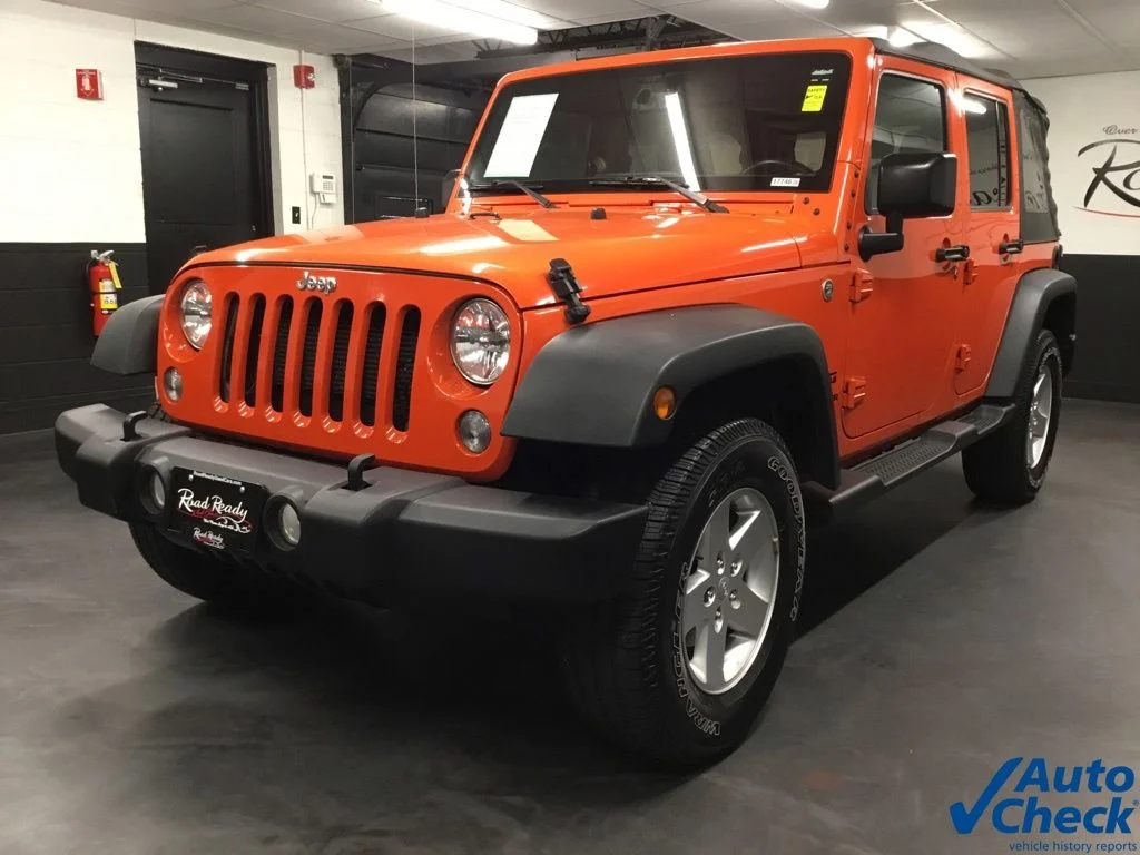 Used 2015 Orange Jeep Unlimited Sport image 5