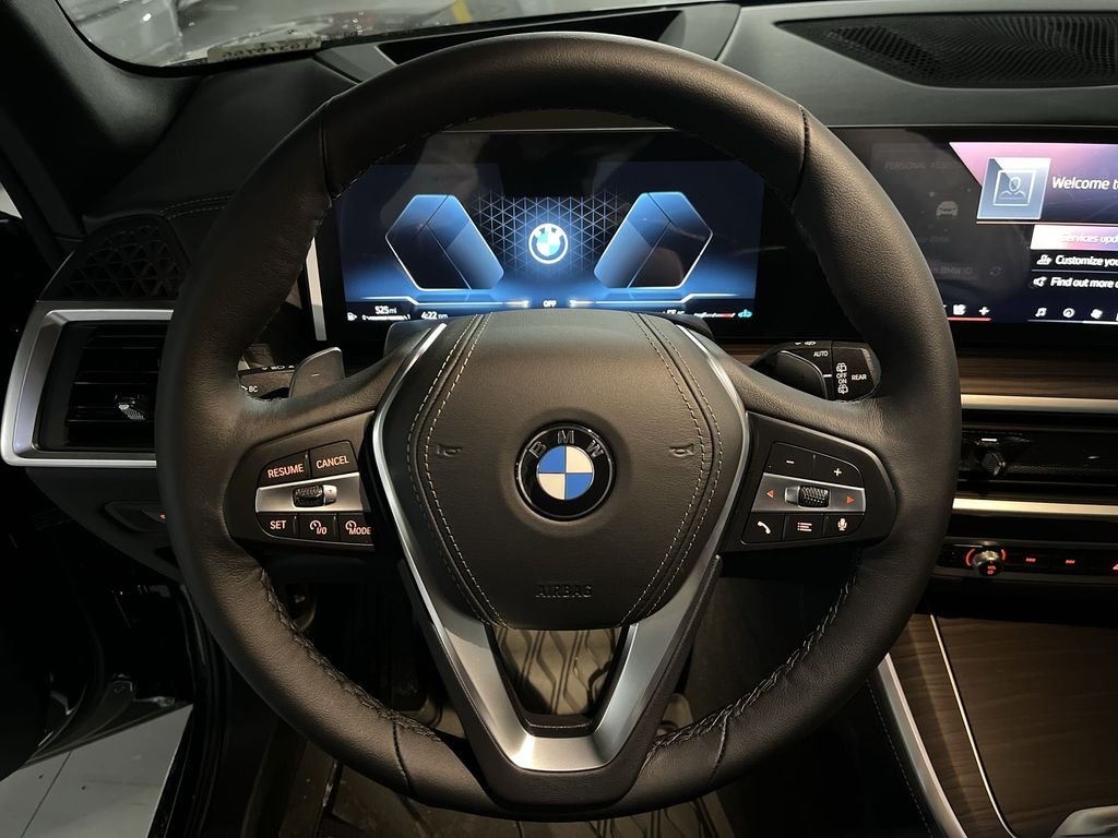 New 2026 Black Sapphire Metallic BMW xDrive40i image 14