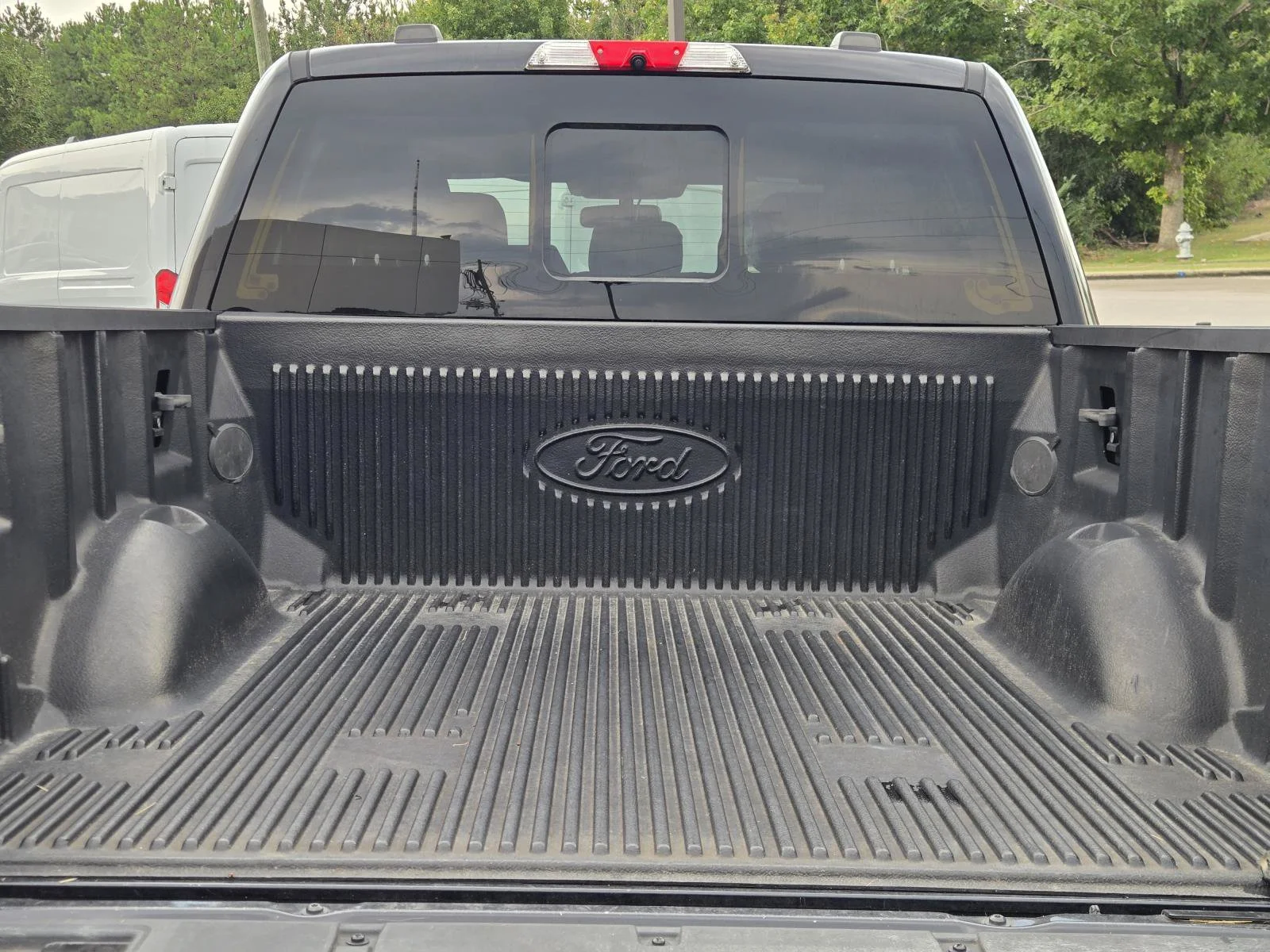 Used 2021 Black Metallic Ford Lariat image 12