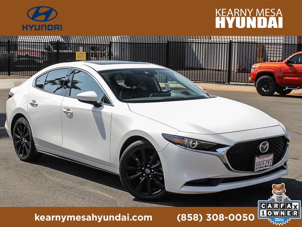 Used 2020 Snowflake White Pearl Mazda Premium image 1
