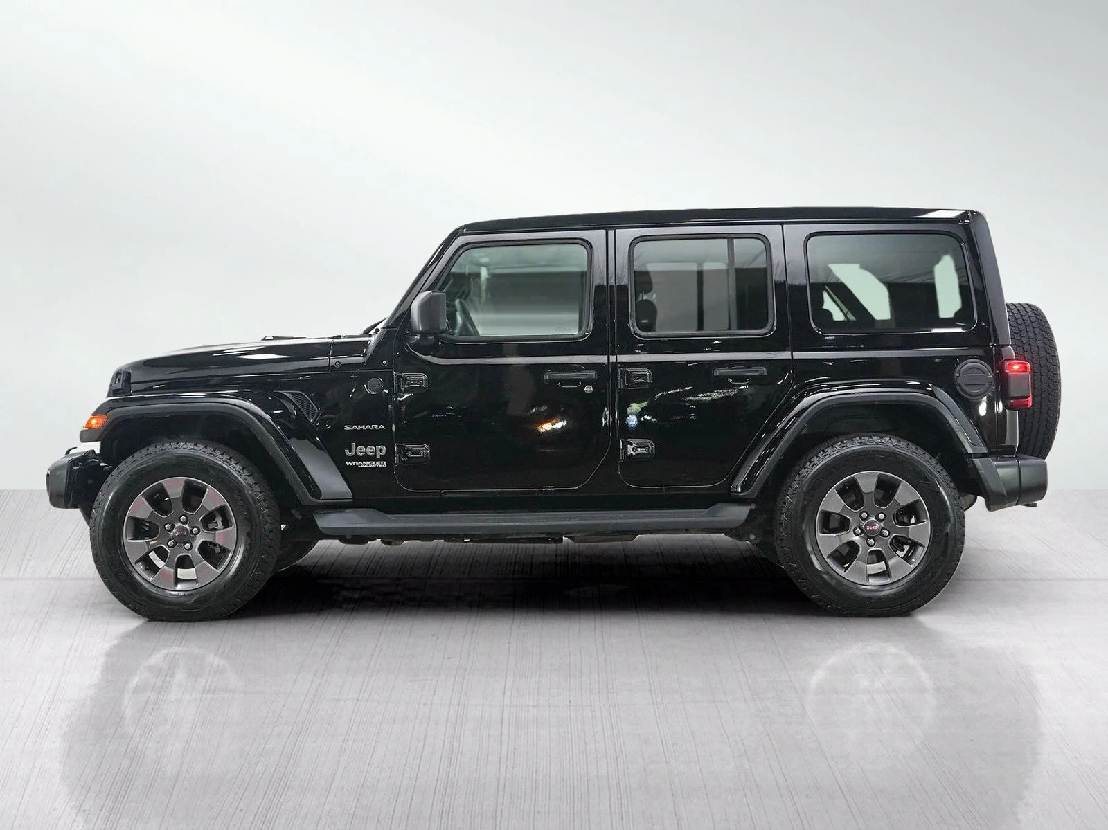 Used 2019 Jeep Wrangler Unlimited Sahara with VIN 1C4HJXEG6KW654323 for sale in Hopkins, Minnesota