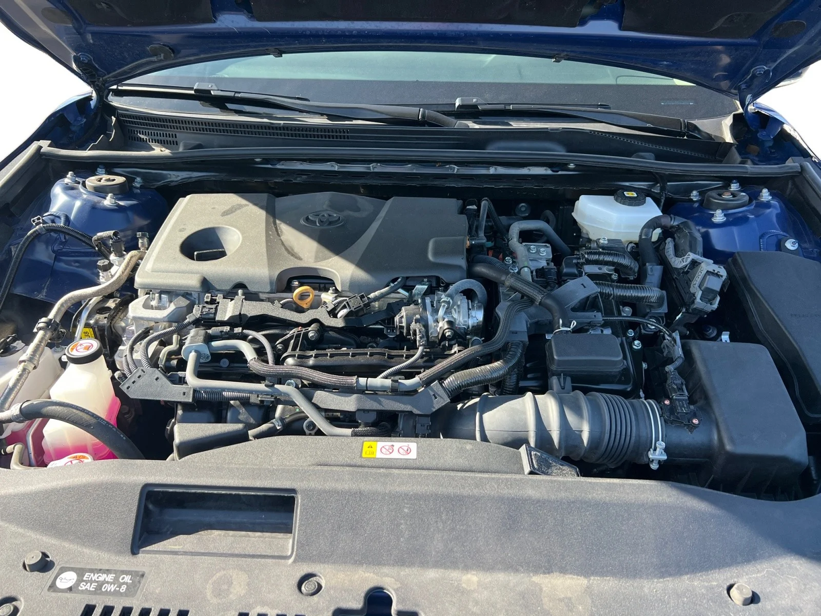 Used 2025 Reservoir Blue Toyota LE image 20