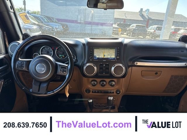 Used 2011 Black Jeep Unlimited Sahara image 13