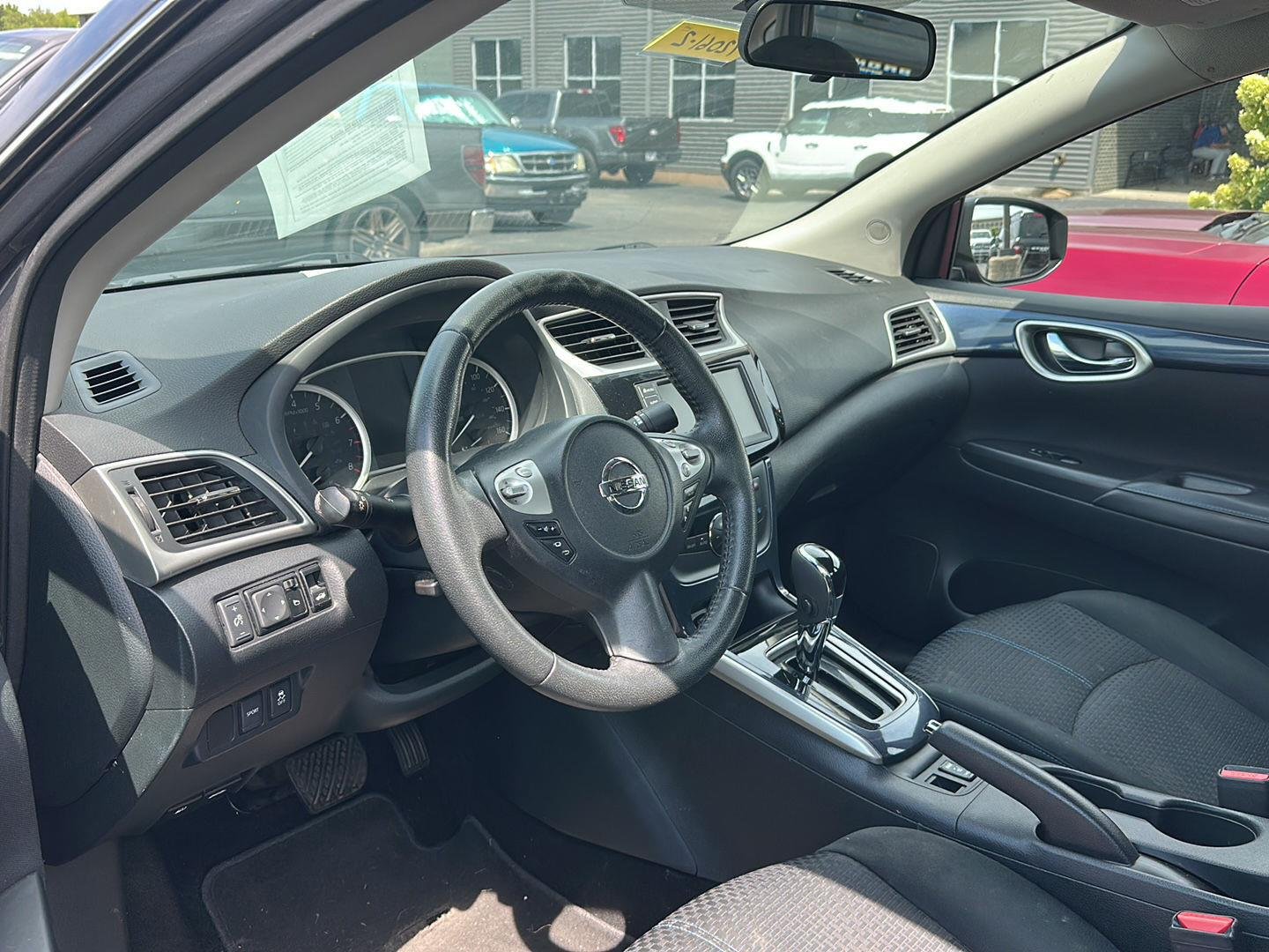 Used 2019 Gun Metallic Nissan SR image 2