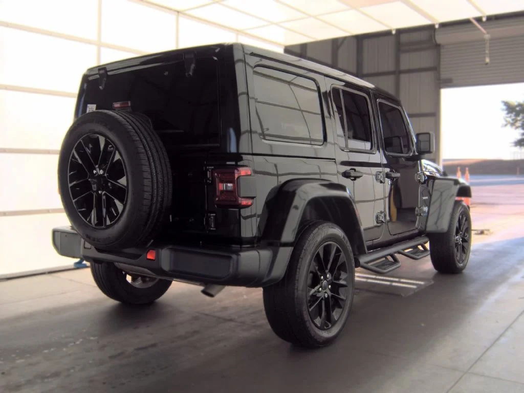 Used 2024 Black Jeep Sahara 4xe image 2