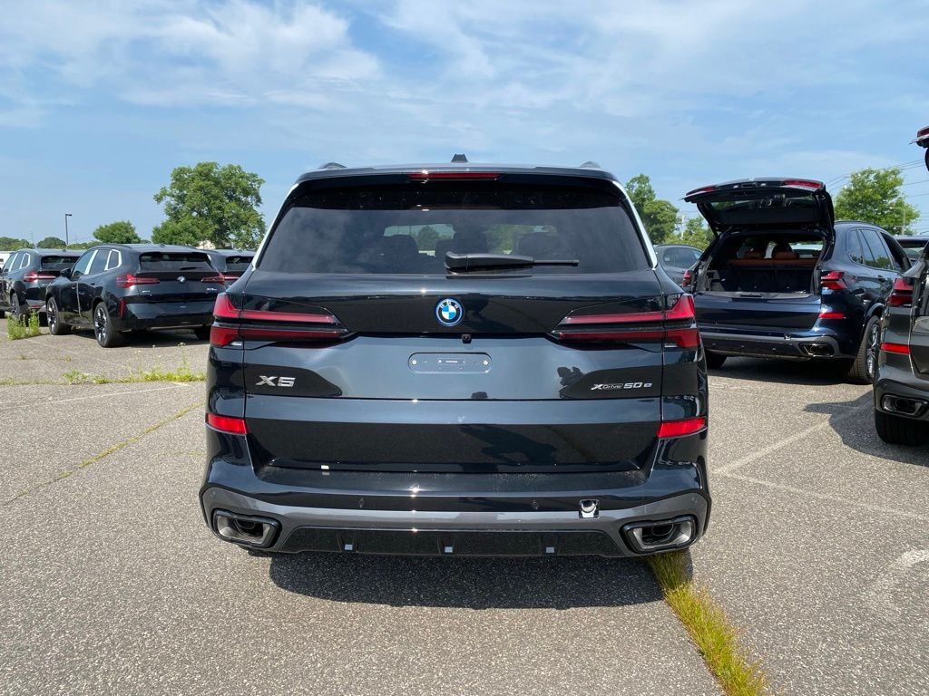 New 2026 Black Sapphire Metallic BMW xDrive50e image 3