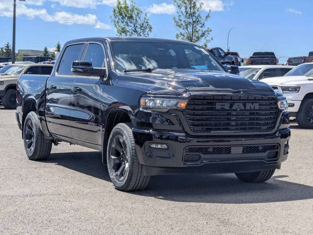New 2026 Black RAM Sport - - 3.0L Hurricane Twin Turbo - Pano Sunroof - Sport Perf Hood - Trailer Brake & More! image 2