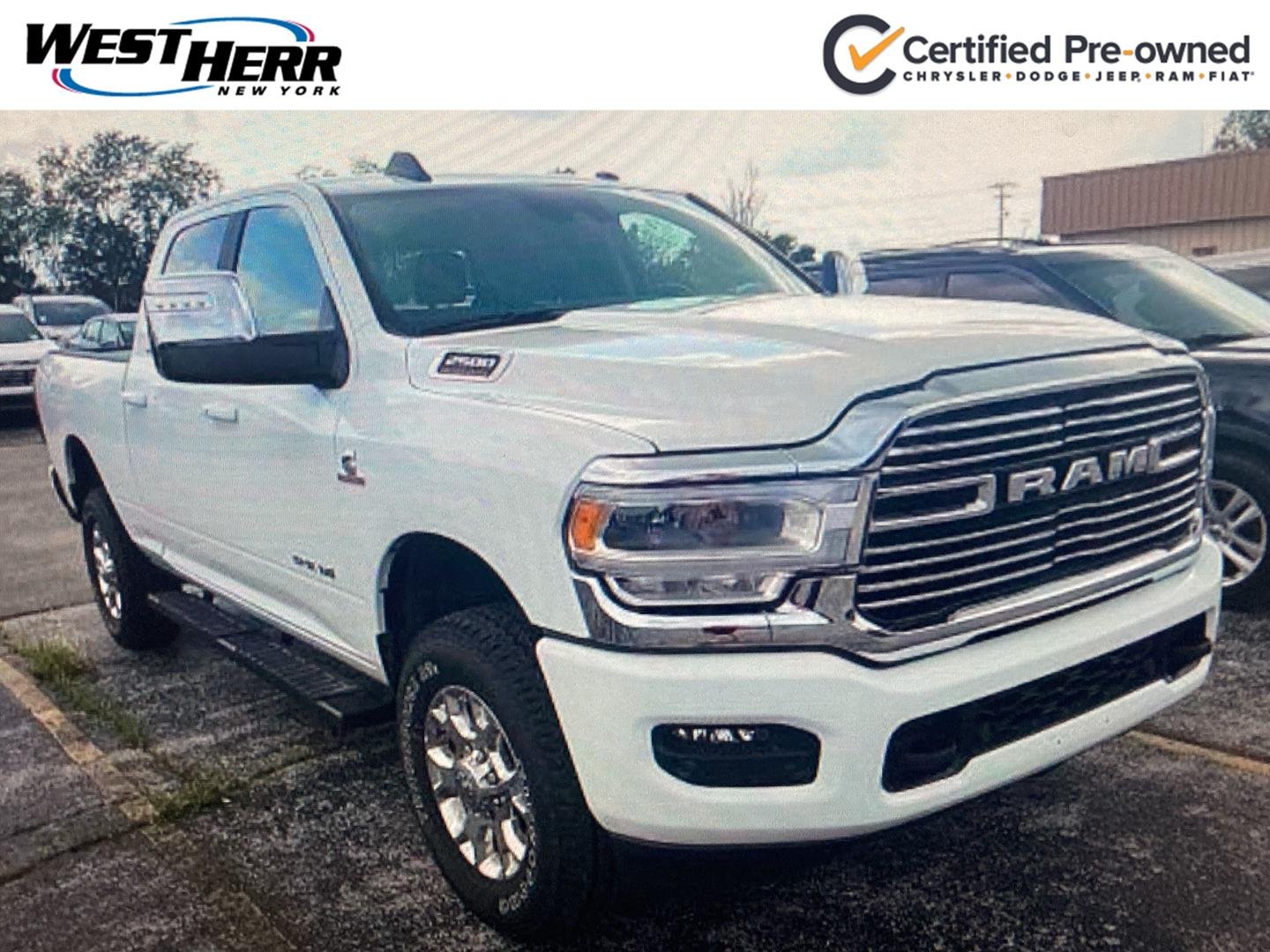 Used 2024 Bright White Clearcoat Ram Laramie image 1