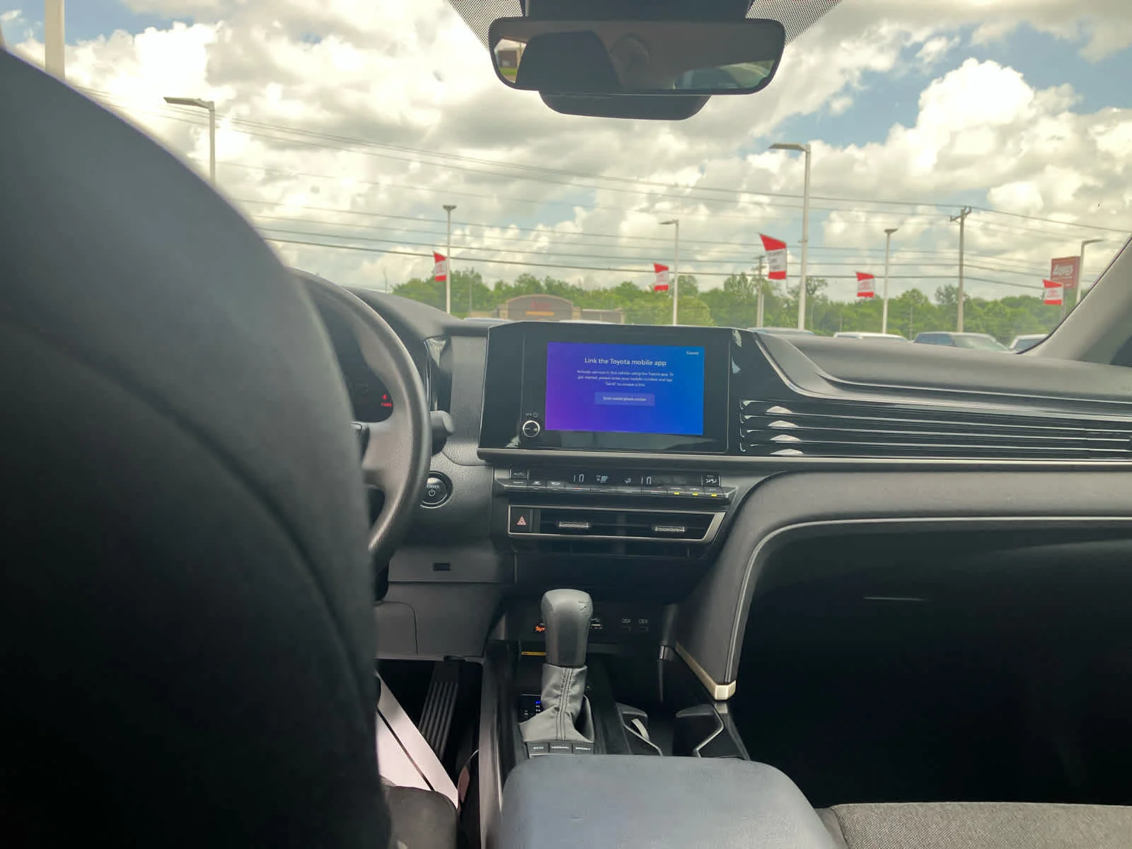 Used 2025 Reservoir Blue Toyota LE image 31