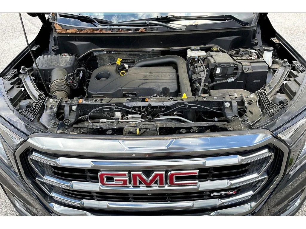 Used 2024 Ebony Twilight Metallic GMC AT4 image 8