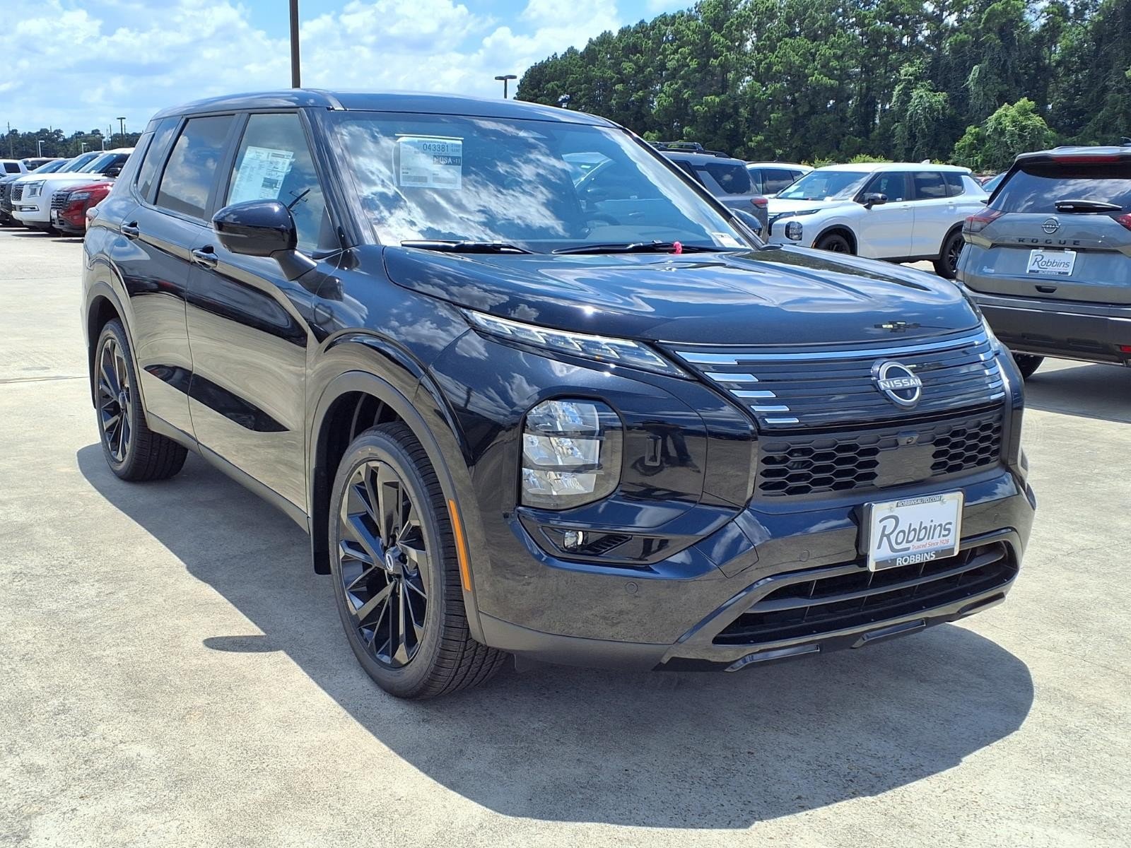 2026 Nissan Rogue Plug-In Hybrid SL Black at Sterling McCall Nissan