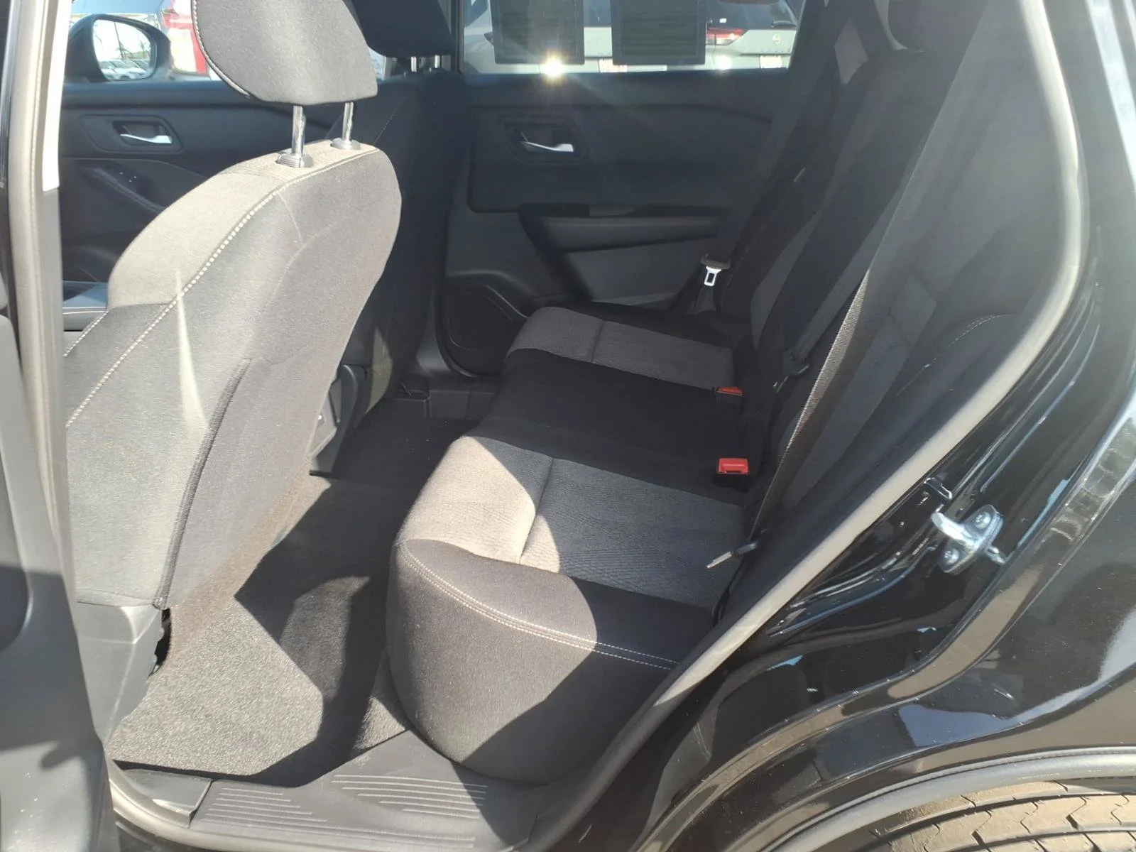 Certified Used 2025 Super Black Nissan SV image 9