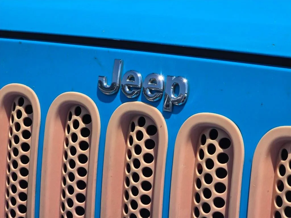 Used 2017 Blue Jeep Unlimited Sahara image 15