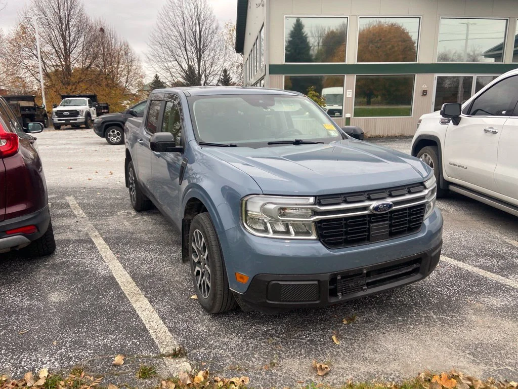 Used 2024 Azure Gray Metallic Ford Lariat image 1