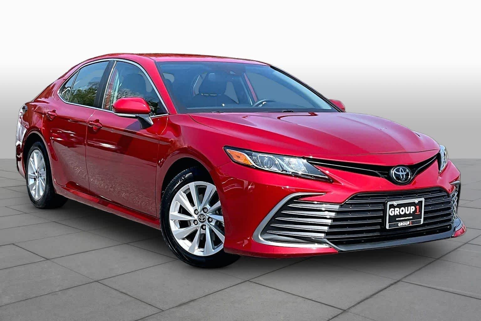 Used 2023 Supersonic Red Toyota LE image 3