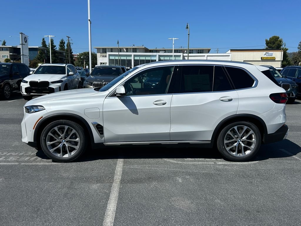 New 2026 Mineral White Metallic BMW xDrive50e image 2