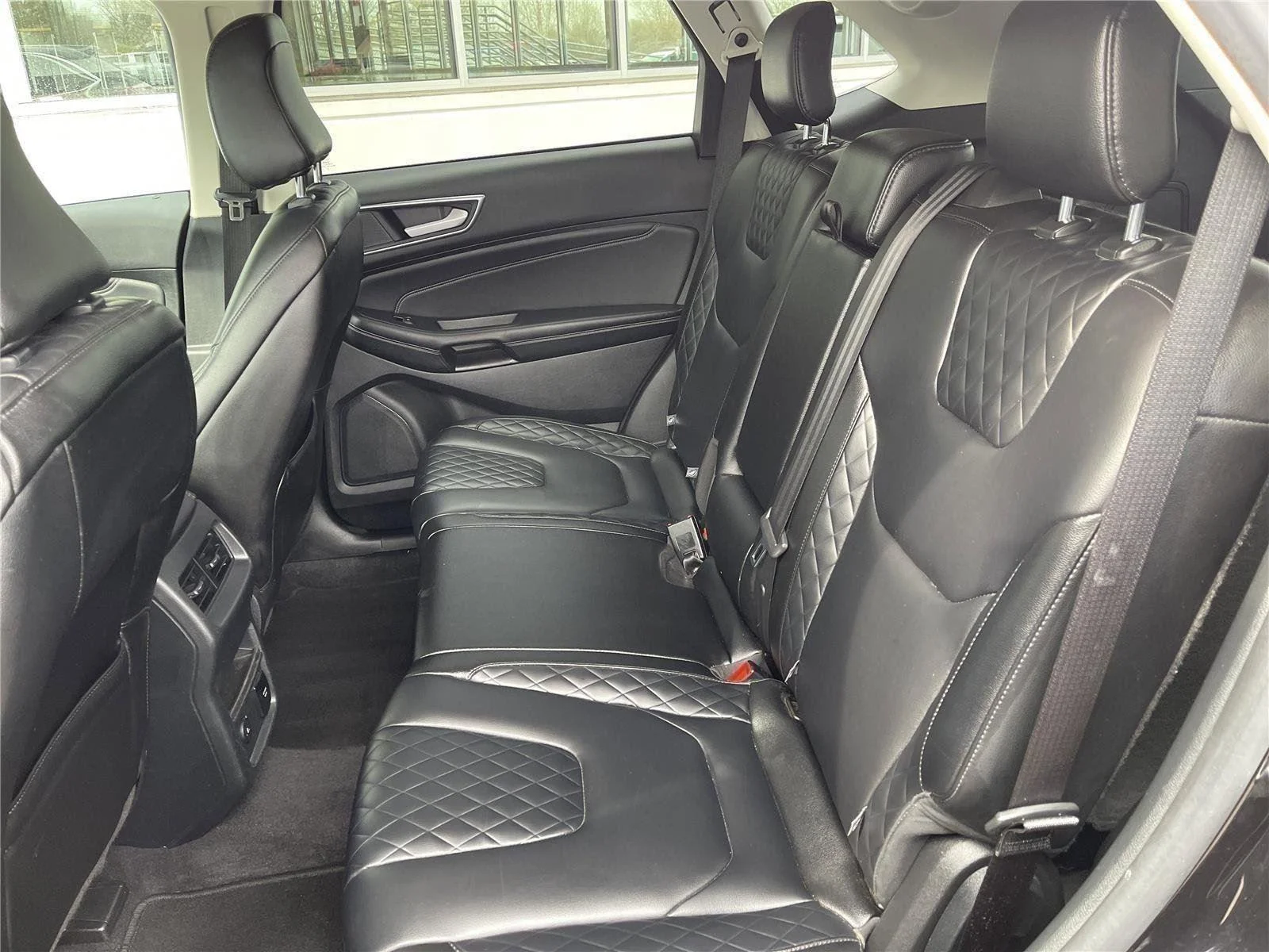 Used 2024 Agate Black Metallic Ford Titanium image 39